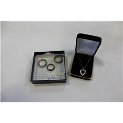 THREE STAINLESS LOST PROPERTY RING BANDS AND NECKLACE