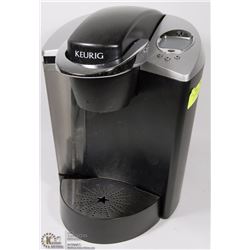 KEURIG COFFEE MAKER DUAL K-PODS AND