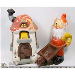 GNOME PUSHING WHEELBARROW AND HIS HOUSE
