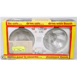 PAIR OF BOSCH HEADLIGHTS NEW IN BOX