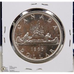 76) 1965 CANADIAN SILVER DOLLAR UNCIRCULATED.