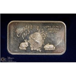 77) 1973 EASTER 1OZ .999 SILVER BAR.