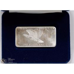 66) 1971 ONE SILVER EAGLE .999 FINE SILVER BAR.