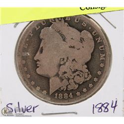 126) 1884 US MORGAN SILVER DOLLAR CIRCULATED.