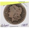 Image 1 : 126) 1884 US MORGAN SILVER DOLLAR CIRCULATED.