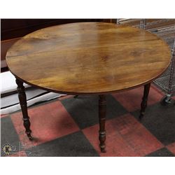 ANTIQUE WOOD HALF MOON SIDE TABLE ON MINI CASTORS