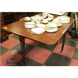 ANTIQUE WOOD TABLE ON SMALL CASTORS  42"X56"X29"H