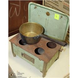 ANTIQUE TOY STOVE WITH POT