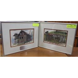 PAIR OF FRAMED JIM ROBB YUKON TERRITORY ARTWORK