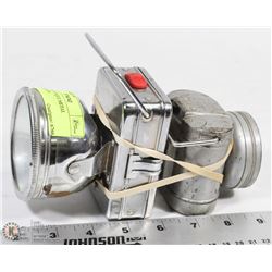 A PAIR OF ANTIQUE METAL FLASHLIGHTS