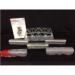 LIONEL TRAINS W/ BRIDGE & 90 DEGREES 027 GAUGE FIGURES