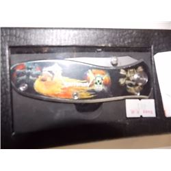 NEW FOLDING KNIFE WITH SKULL IMAGE