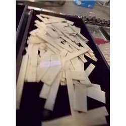 TRAY OF IVORY PIECES