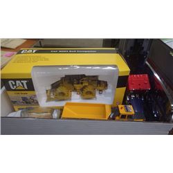 BOX WITH CAT COLLECTIBLE DIE CAST 825 H SOIL COMPACTOR IN BOX, VOLVO A25C DUMP TRUCK, 1955 FORD TOOT