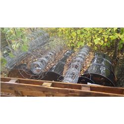 ASSORTMENT OF 3 ROLLS PAGE WIRE, 3 METAL BARRELS, SMALL PILE OF POSTS AND MISC CONCRETE BLOCKS, BRIC