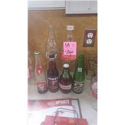 ONE 1.4 LTR PLUS 1 1.5 LTR COCA-COLA BOTTLES PLUS 4 MISC BOTTLES (ONE HEIDELBERG STUBBY)