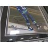Image 2 : SIGNED VANCOUVER CANUCKS PRINT (TREVOR LINDEN ON GLASS, CAPTAINS ON BACK)
