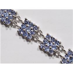 #30-STERLING SILVER 126 TANZANITE (10.80CT)