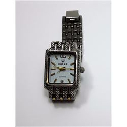 #2 - SILVER TONE ROLEX REPLICA TANK WATCH.