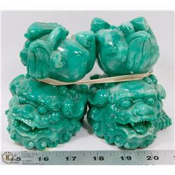 A PAIR OF CHINESE JADE COLOURED DRAGON FIGURINES