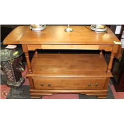 BUTTERFLY WOOD SOFA TABLE ON CASTORS.