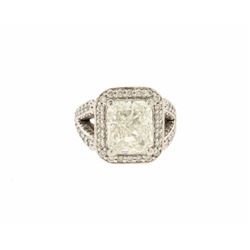 RING:  [1] Platinum ring set with a cut cornered rectangular modified brilliant (radiant) cut diamon