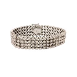 BRACELET: 10kt white gold diamond bracelet set with round brilliant cut diamonds, estimated 11.75 ct