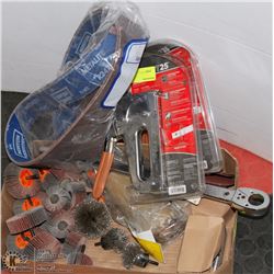 FLAT WITH STAPLERS, SANDPAPER, AND MORE