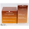 Image 1 : CLARINS DELICIOUS SELF TANNING CREAM AND