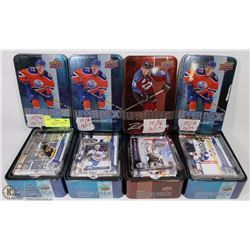 4 TINS OF 2015-2017 UPPER DECK HOCKEY CARDS.
