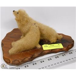 PAIR OF SEALS ON WOODS BASE