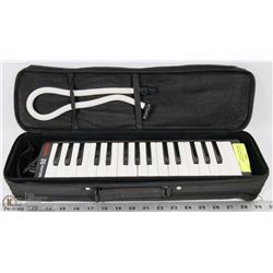 HOHNER AIR KEYBOARD INSTRUMENT IN CASE.