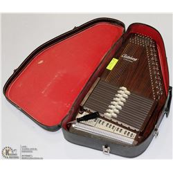 AUTOHARP BY OSCAR SCHMIDT IN CASE.