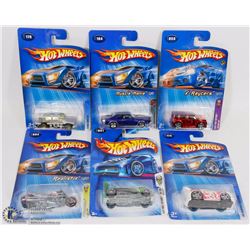 LOT OF 6 HOTWHEELS CARS IN PACKAGES.
