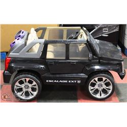 CHILD'S SIT IN POWER WHEELS CADILLAC ESCALADE WITH
