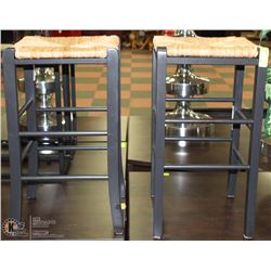 SHOWHOME PAIR OF WOOD AND WICKER STOOLS