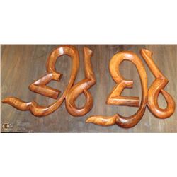 PAIR OF WOOD SPIRITUAL SYMBOL WALL HANGINGS