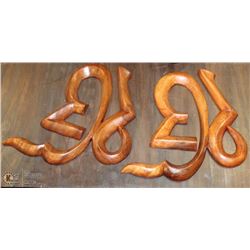 PAIR OF WOOD SPIRITUAL SYMBOL WALL HANGINGS
