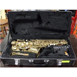 ALTO SAXOPHONE WITH REEDS, CASE, AND NEWLY PADDED
