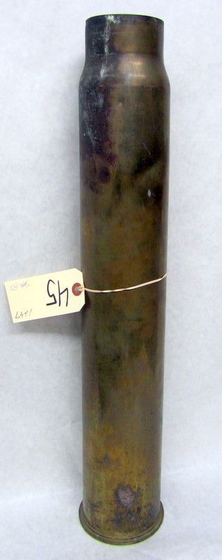 SPENT ARTILLERY SHELL