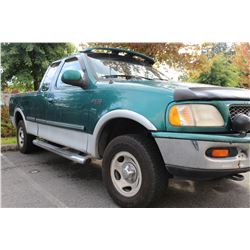 1997 FORD F150 GREEN PICKUP WITH 4X4 AND 477000 KM RUNS AND HAS REGISTRATION AND TWO KEYS