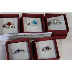 LOT OF FIVE DINNER RINGS