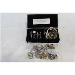 BLACK VELVET CASE OF JEWELLRY AND BAG OF ASSORTED RINGS