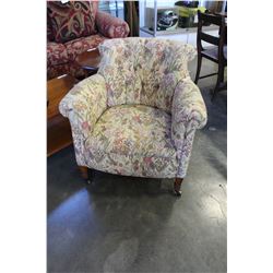 VINTAGE BUTTON BACK ARMCHAIR ON CASTORS