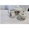Image 2 : 2 TEAPOTS 2 CREAM AND SUGARS AND SMALL BOWLS