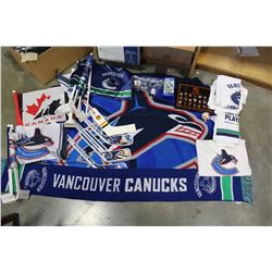 BOX OF CANUCK COLLECTIBLES AND FLAG