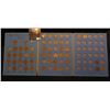 Image 1 : Partial Set of 1959-80 Lincoln Cents in a blue Whitman folder.