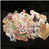 Image 1 : Bag Containing 1000's of Used US and Foreign Stamps some on Paper.