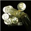 Image 1 : (22) 1956 D Silver Washington Quarters in Gem BU condition, stored in a plastic tube.