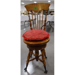 Oak swivel arm chair